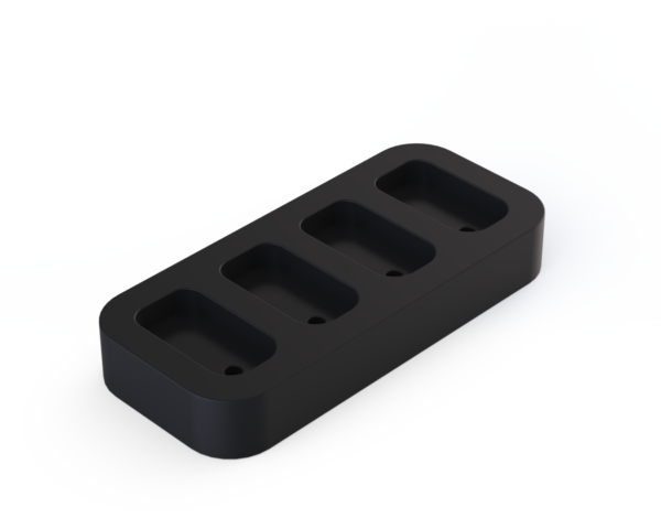 a black plastic holder with three compartments